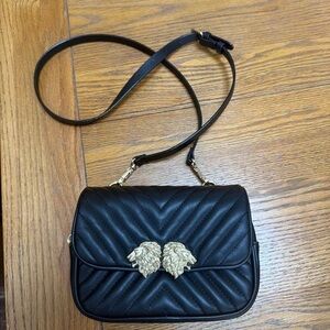 Women’s Black Quilted Crossbody Bag with Gold Lion Accent